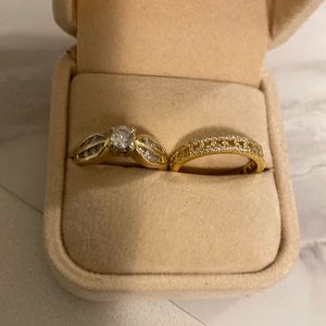 14 kt yellow and white gold solitaire with band .